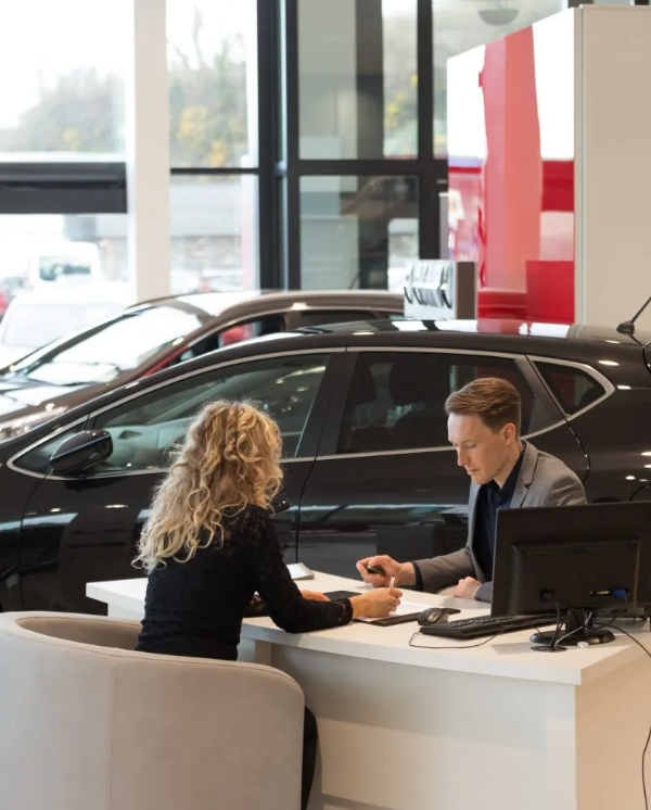 Modern car dealership showroom with premium vehicles